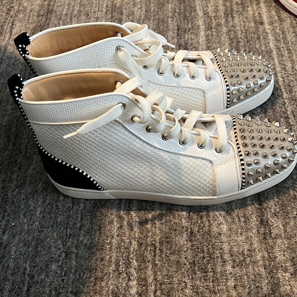 Christian Louboutin
Spiked High-Top Sneakers
